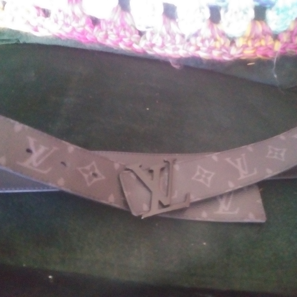 Louis vuitton belt. Black and grey monogrammed belt with black lv buckle.